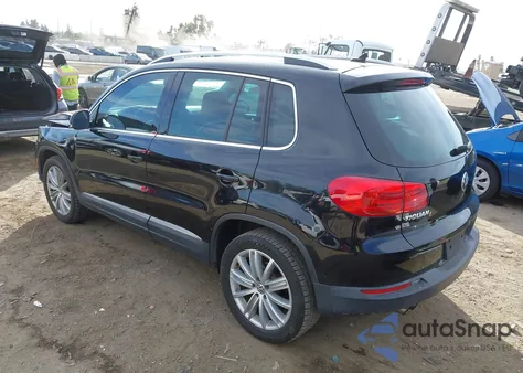 2014 Volkswagen Tiguan Sel z USA, uszkodzony, nr VIN WVGAV3AX4EW578234